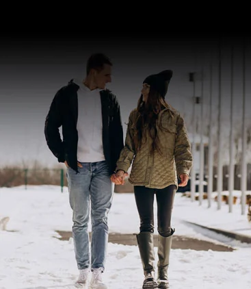 A couple walking in the snow